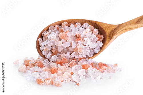 Wooden spoon with himalayan pink salt isolated on white background.