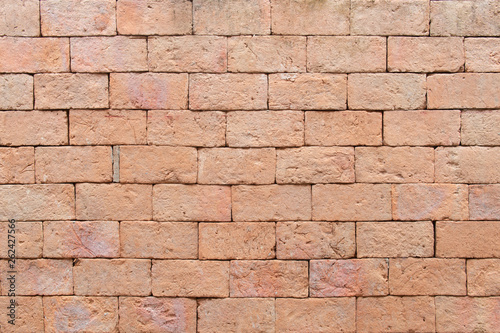 Clay bricks wall texture and background.Brown brick.