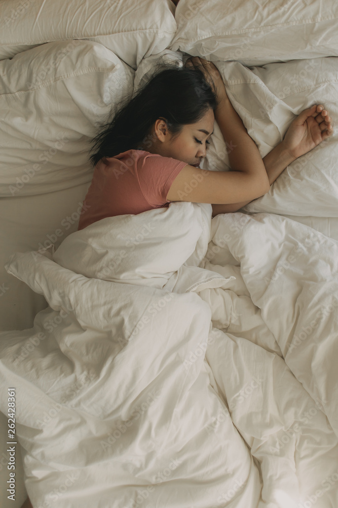 Tired woman rest and sleep in her warm bedroom. Tired woman rest and sleep in her warm bedroom.