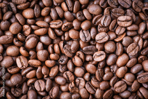 Roasted coffee beans texture background / Close up coffee bean top view