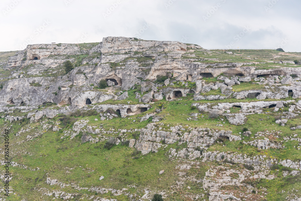 Caves in a Mountain at The Ancient City of Matera, Italy