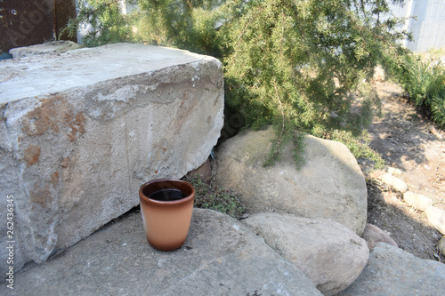A Cup of coffee among the rocks. © Aksana