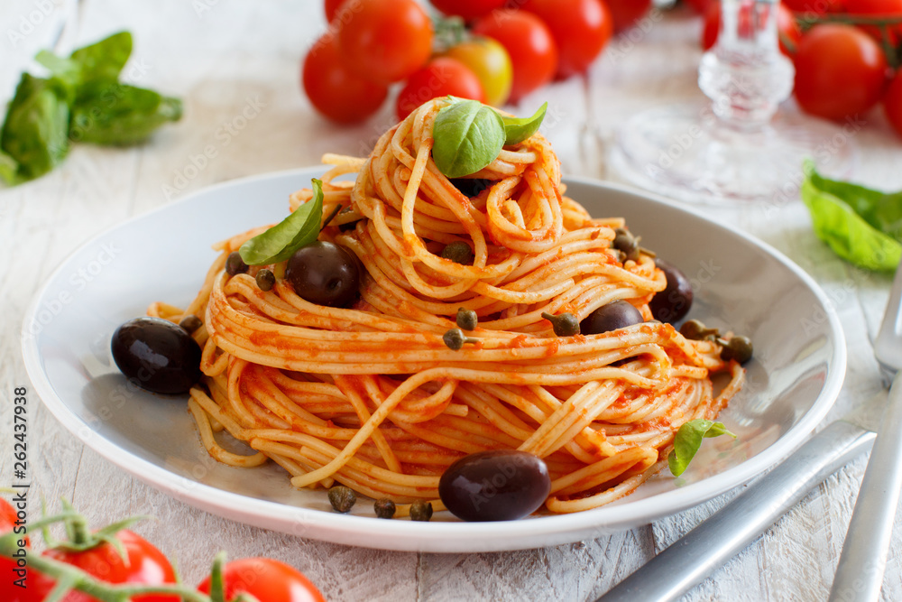 Spaghetti with tomato sauce olives and capers Spaghetti with tomato sauce olives and capers