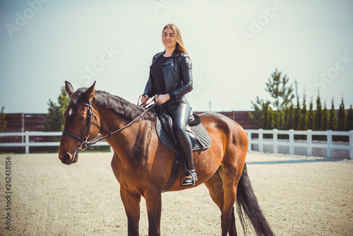 Rider elegant woman talking to her horse. Portrait of horse pure breed with woman. Equestrian horse with rider playpen for horses background  © T.Den_Team