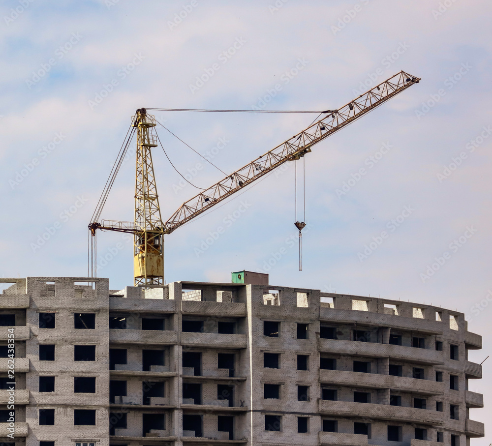 Crane is building a multi-storey house