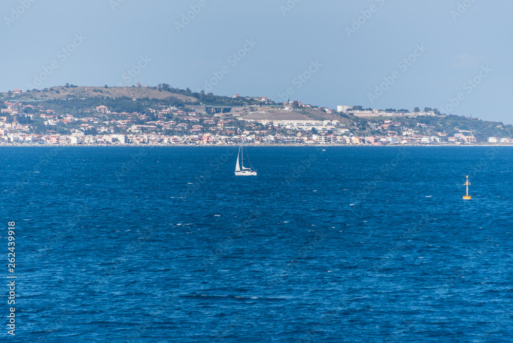 Sailboat on the Blue Mediterranean off the Coast of Sicily