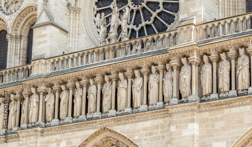 The western facade of catholic cathedral Notre-Dame de Paris. Built in French Gothic architecture, and it is among the largest and most well-known church buildings in the world