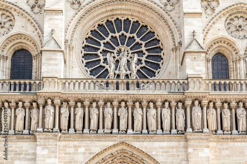 The western facade of catholic cathedral Notre-Dame de Paris. Built in French Gothic architecture, and it is among the largest and most well-known church buildings in the world