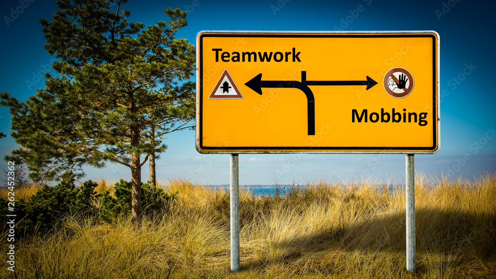Street Sign Teamwork versus Mobbing Street Sign Teamwork versus Mobbing