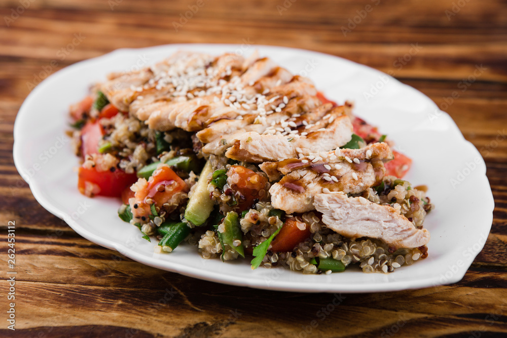 healthy salad with quinoa, vegetables and grilled chicken healthy salad with quinoa, vegetables and grilled chicken