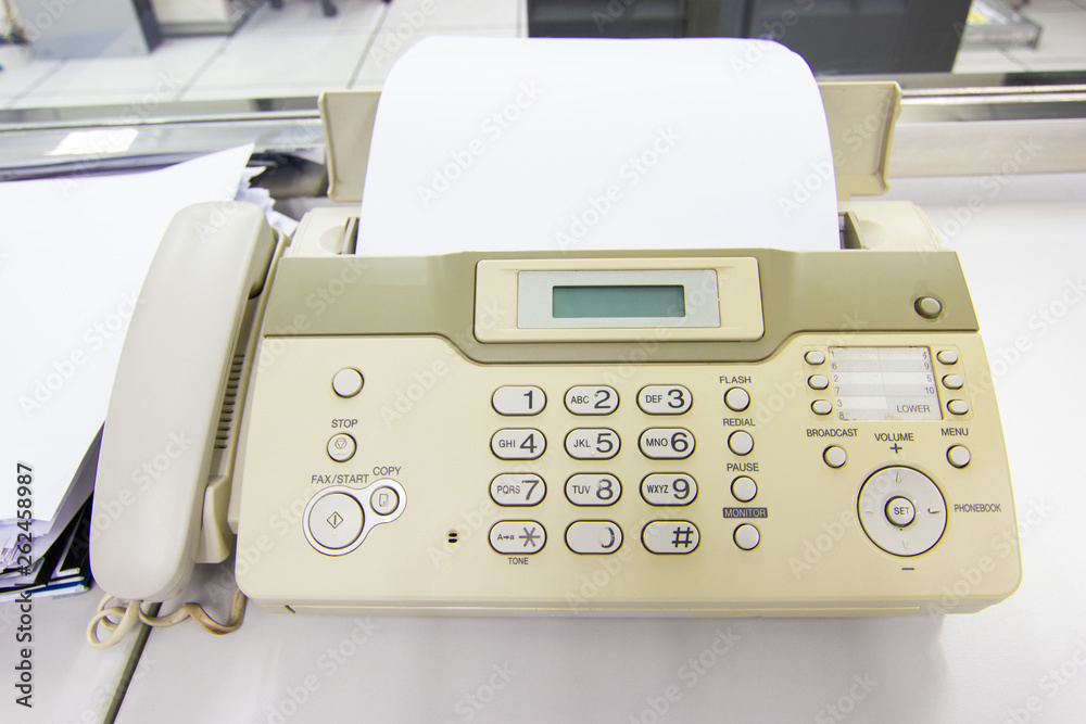 The fax machine for Sending documents in the office concept equipment needed in office