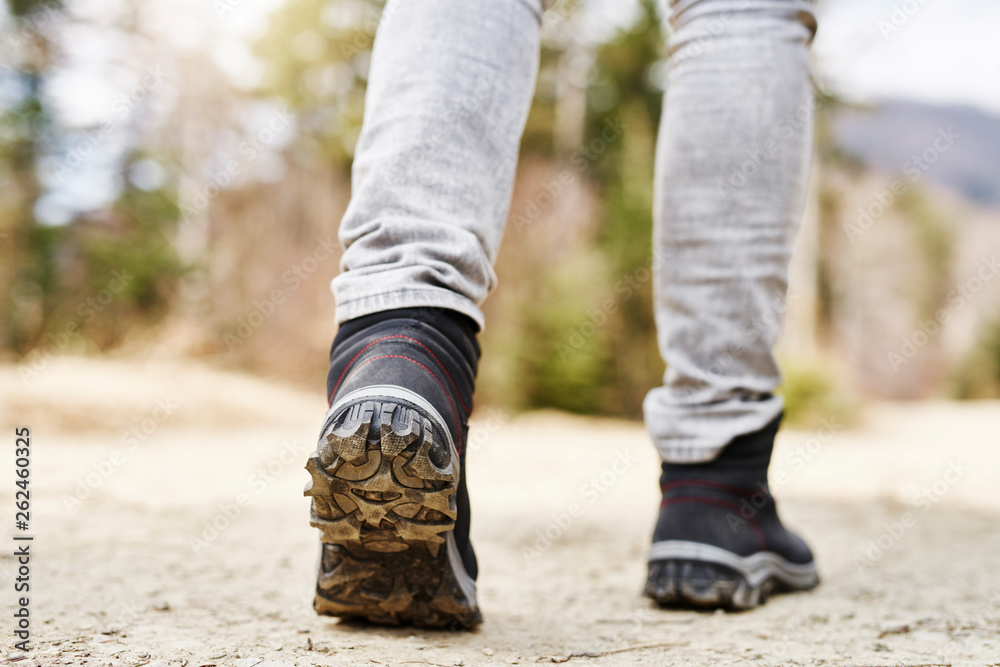 Low section of man hiking in the mountains