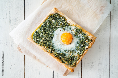 homemade Easter cake with egg and spinach photo