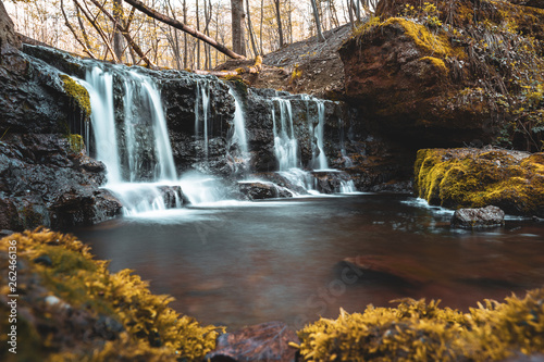  A hidden Waterfall in Autumn in the middle of a German Forest