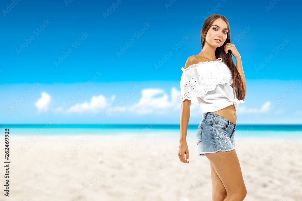 Summer time on beach and slim young woman Summer time on beach and slim young woman