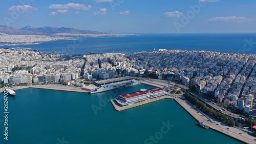 Aerial drone bird's eye view of famous crowded port of Piraeus one of the largest in Europe where ships travel to popular Aegean destinations, Attica, Greece © aerial-drone