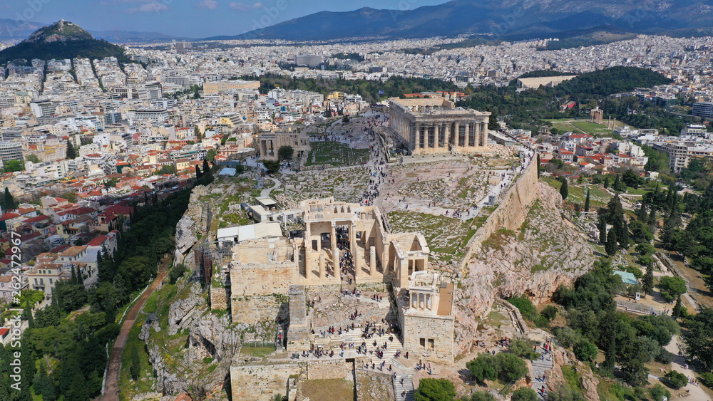 Aerial drone photo of iconic propylaia and the Parthenon in Acropolis hill, masterpiece of ancient world, Athens historic centre, Attica, Greece