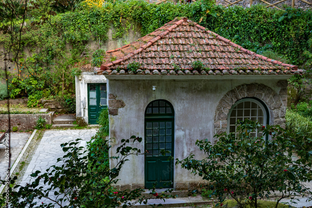 service house in old garden