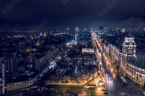 Arial view of night city Voronezh, evening cityscape with roads, parks and traffic, drone shot