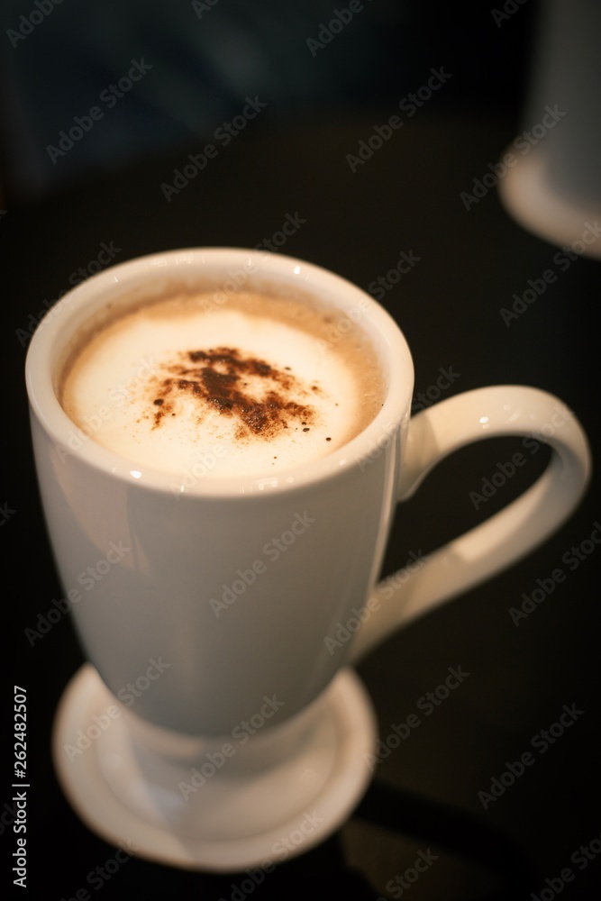 Obraz premium cup of coffee on black background