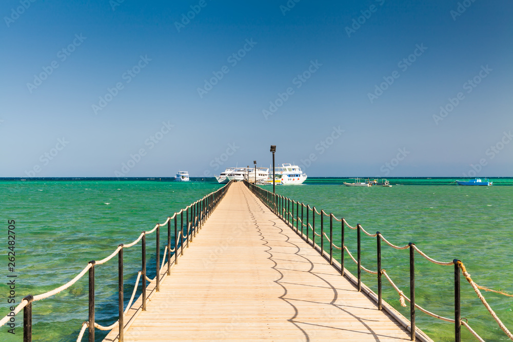 Long wooden pier on the shores of the Red Sea. Egypt.
