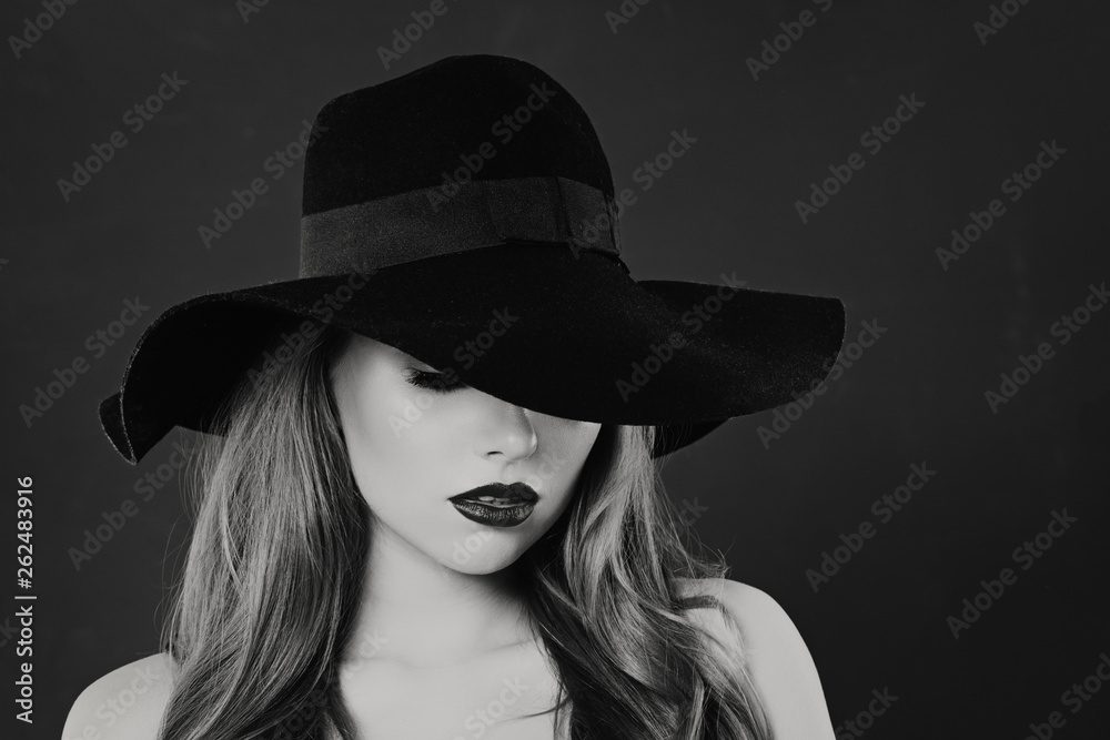Black and white portrait of sensual woman model in classic hat Black and white portrait of sensual woman model in classic hat