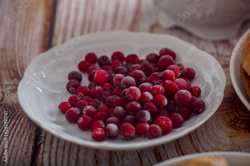 Frozen cranberries in sugar powder close up