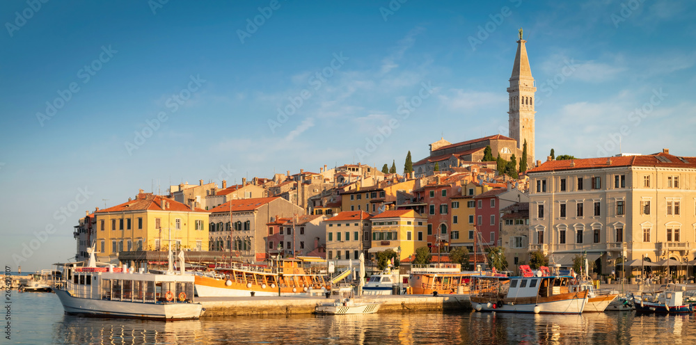 Colorful morning in Rovinj, Istria with boats in the port, Croatia