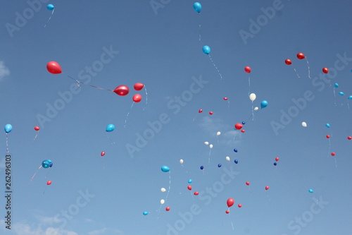 Colorful balloons ls in the blue sky