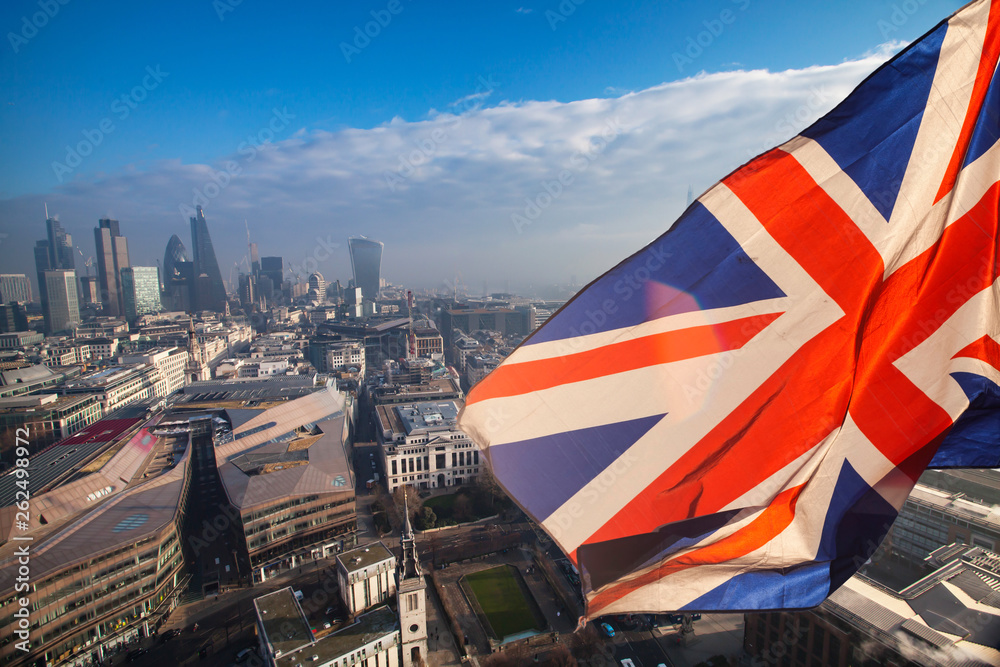 Rooftop view of London and UK flag