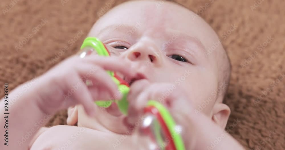 Baby with a rattle Baby with a rattle