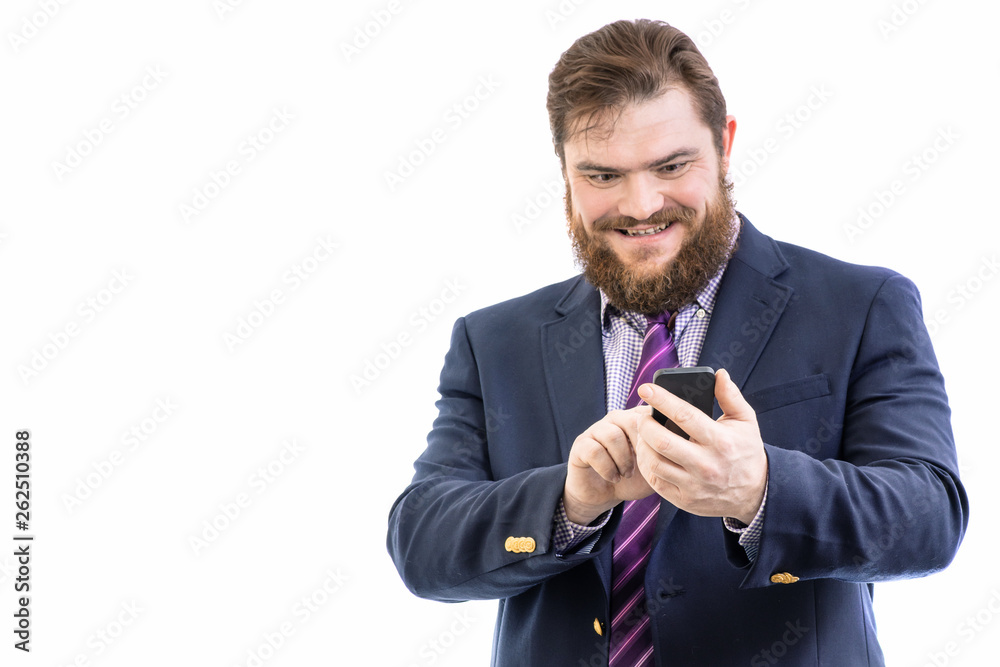 big funny smiling bearded business man using mobile smart phone, isolated on white big funny smiling bearded business man using mobile smart phone, isolated on white