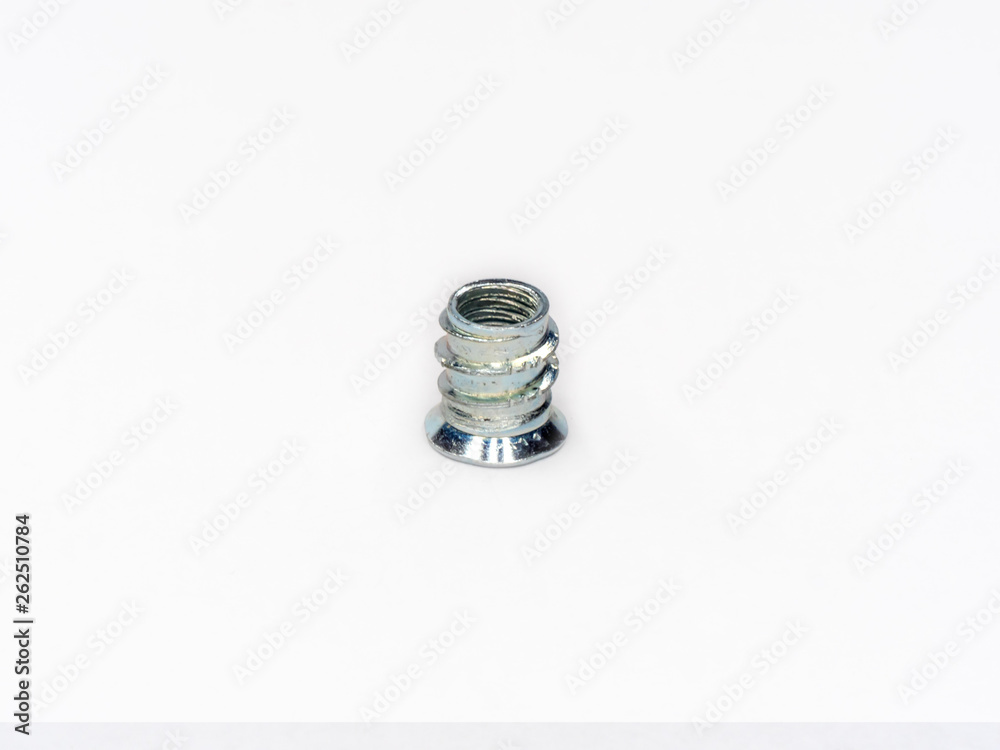 Zinc Alloy Hexagon Socket Flat Head Insert Wood Screw Nut Bolt on white. Zinc Alloy Hexagon Socket Flat Head Insert Wood Screw Nut Bolt on white.