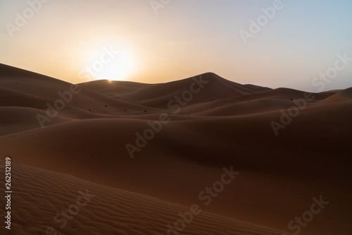 Sunrise on sand dunes, Sahara Sand dunes africa morocco © slava2271