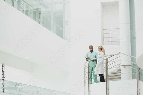 Medical professionals discussing results in a hospital