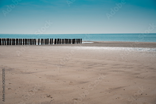 north sea coastline of Burgh Haamstede with breakwaters, The Netherlands © Corinne