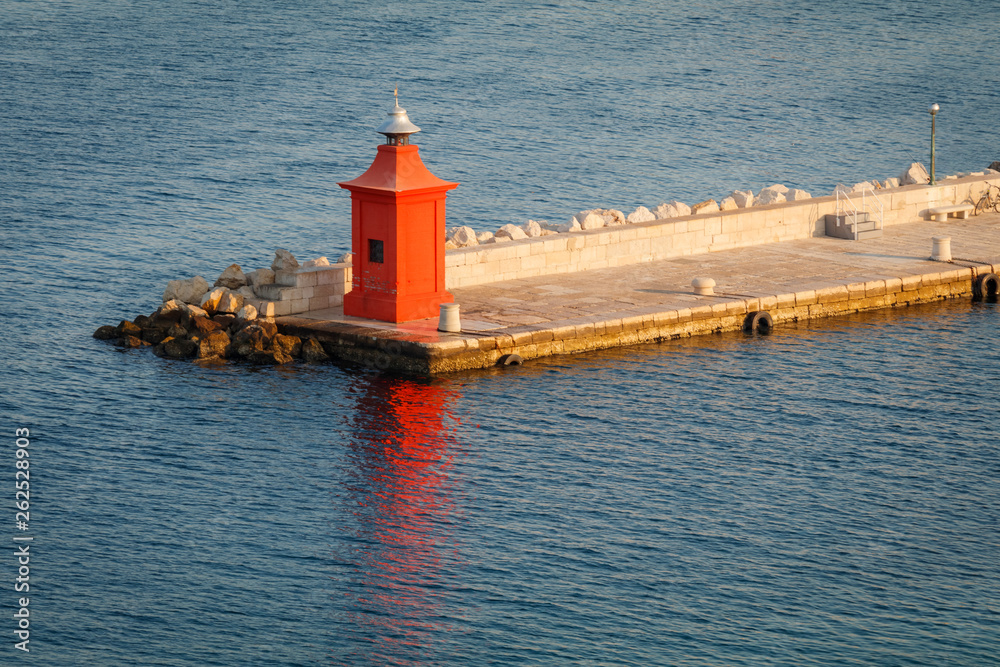 Old red lighthouse in Piran, Slovenia