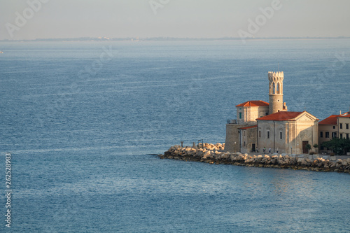 Obraz na płótnie Old Church on the Pier in Piran during sunrise, Slovenia w salonie