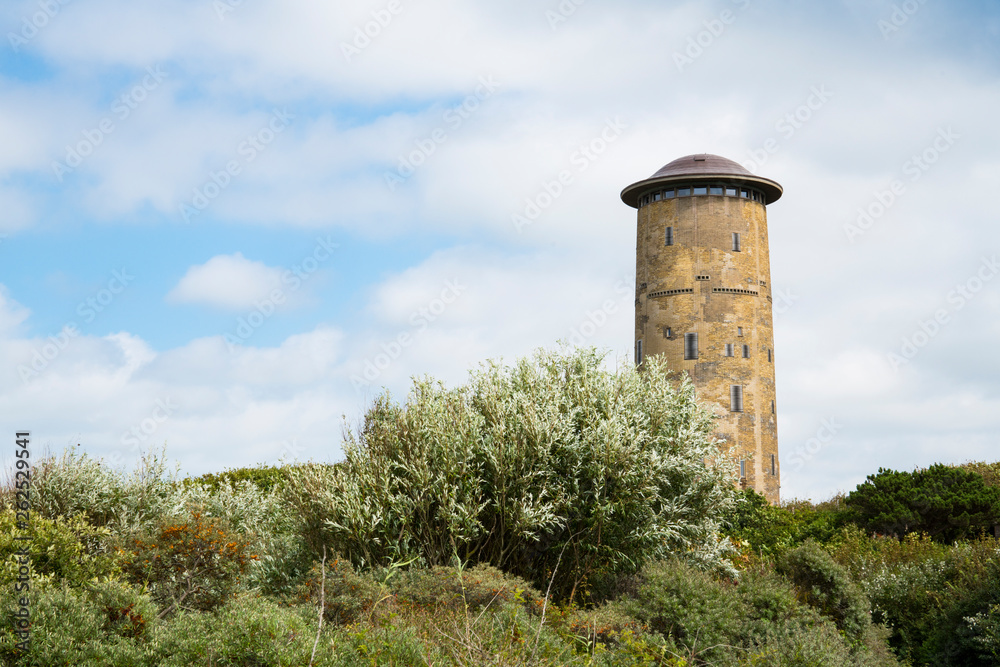 Water tower in dunes of Domburg, The Netherlands. Norsth Sea coast. Space for text