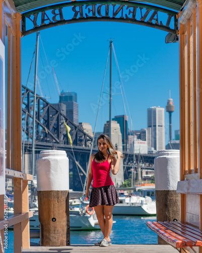 Photography Young girl standing at the pier