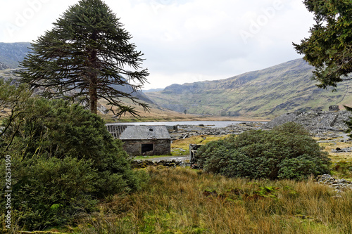 A view of the lake on the Cwmorthin Waterfall trail in the mountains of Snowdonia National Park, Wales. photo