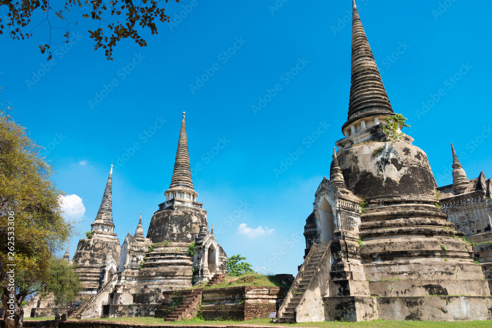 Fototapeta premium Ayutthaya, Thailand - Apr 10 2018: WAT PHRASISANPETH in Ayutthaya, Thailand. It is part of the World Heritage Site - Historic City of Ayutthaya.