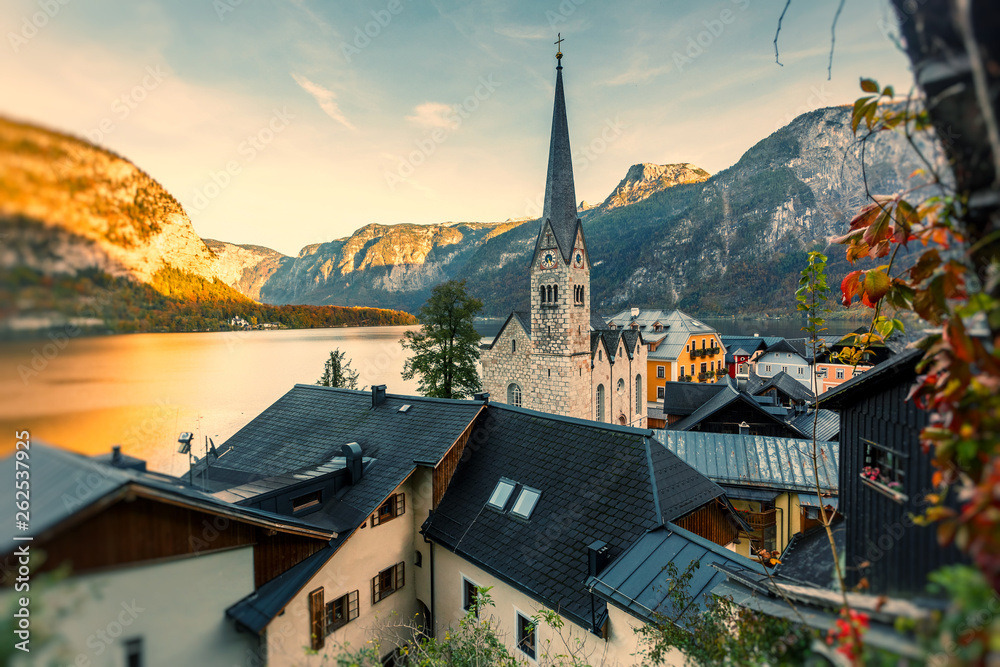 Wonderful Colorful Sunset. amazing view on the lake Hallstatter and Hallstatt Lutheran Church