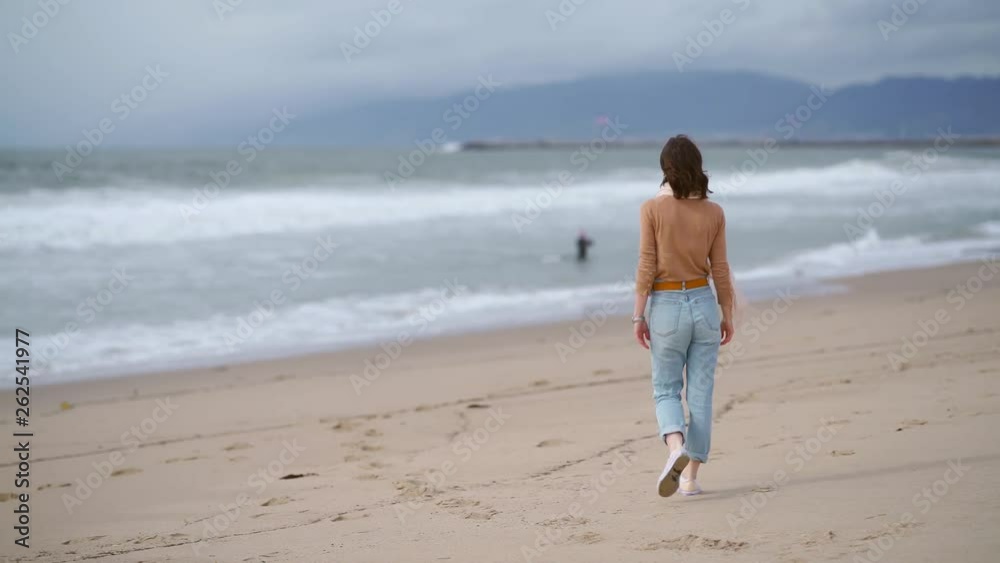 Young girl on the beach in California Young girl on the beach in California