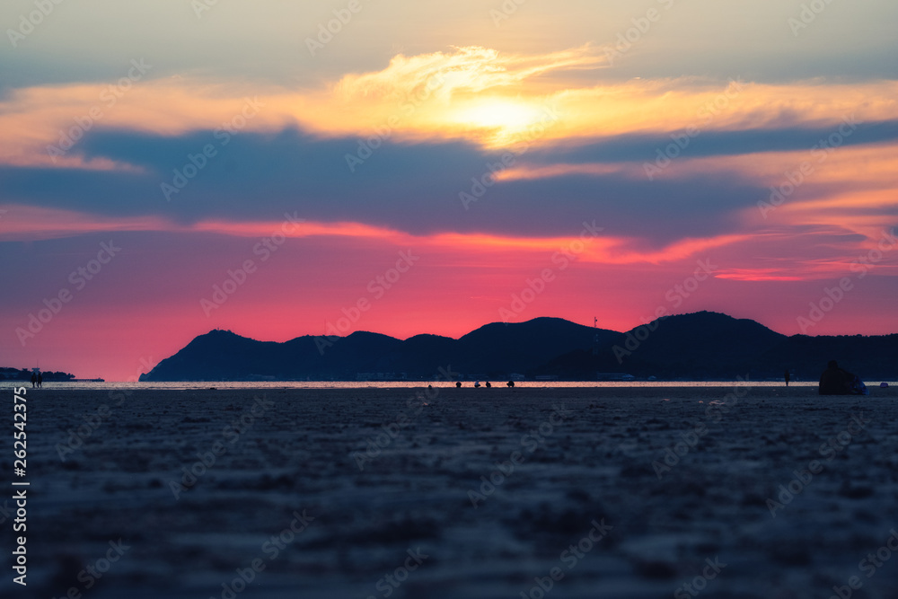 Background of colorful sky concept: Dramatic sunset with twilight color sky and clouds.