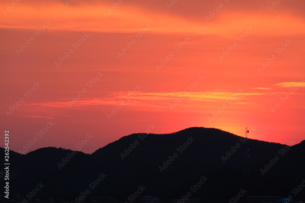 Fototapeta premium Dramatic sunset and sunrise sky. Golden time cloud and sky.