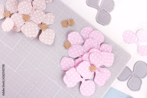 Making diy project. Paper decoration. Craft tools and supplies for scrapbooking. Season home flower decor. photo