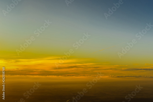 landscape sunrise or sunset from the window of the plane © IrBreeze