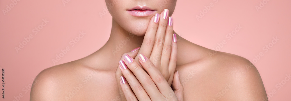 Fototapeta premium Beauty Woman with perfect Makeup and Manicure. Glamour Girl. Pink Lips and Nails. Skin care foundation. Beauty girls Face isolated on light Background. Fashion photo