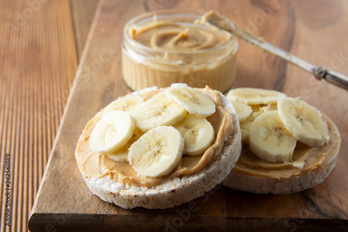 Peanut butter and banana on rice cakes, healthy, dietary food.